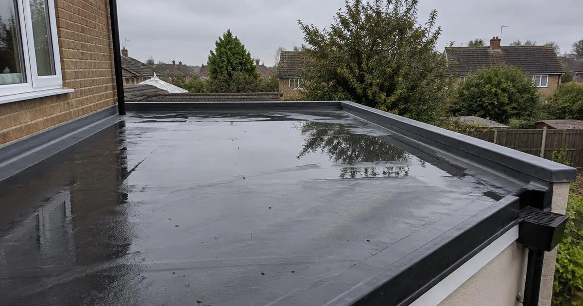 Standing water sitting on a flat roof membrane