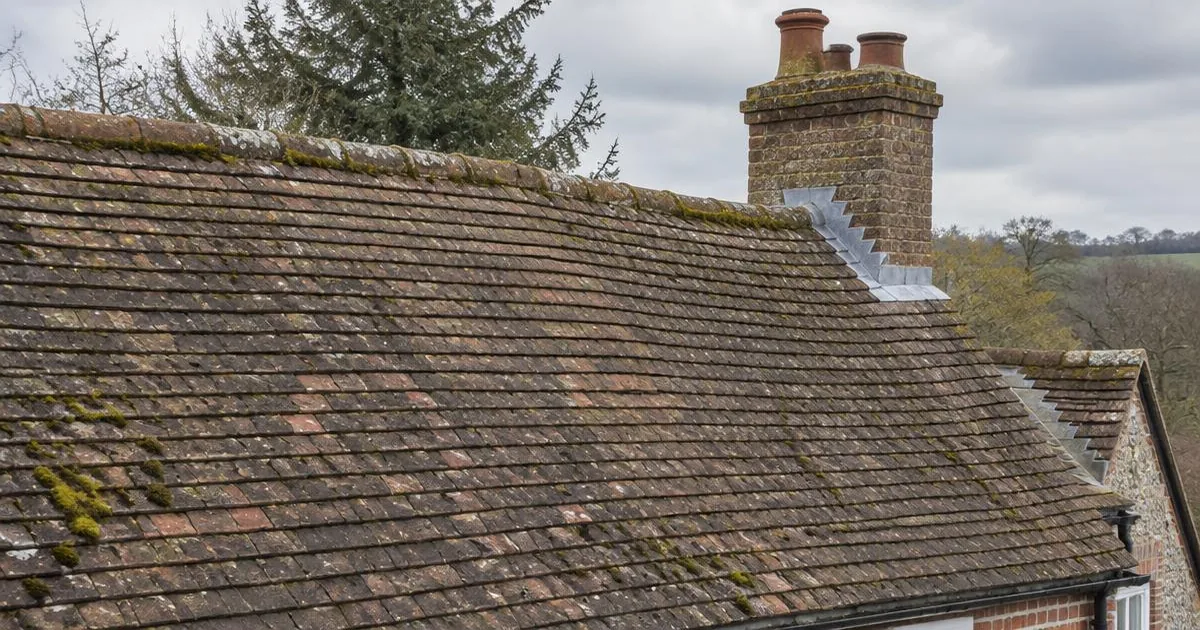 Weathered clay tiled roof showing its age